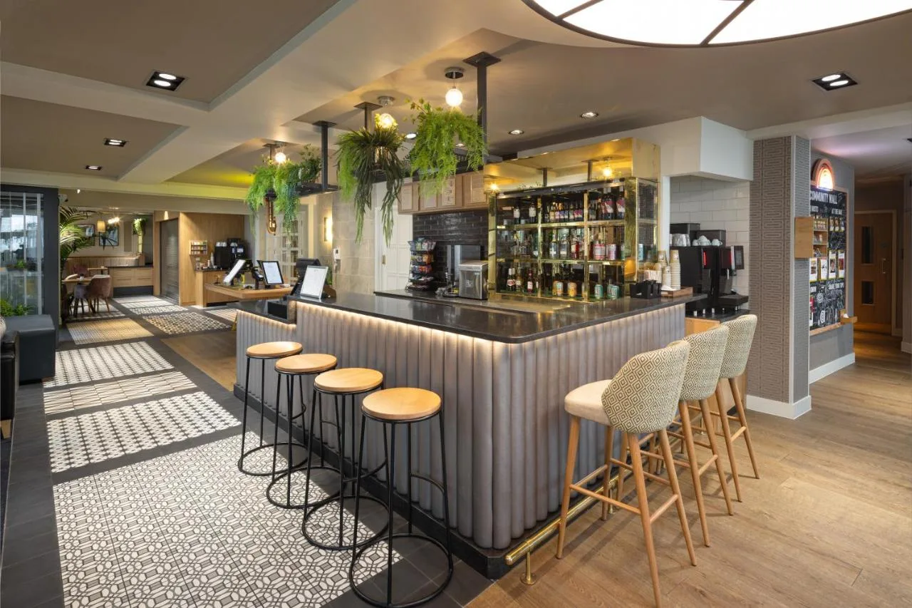 Bar area with stools inside Point A Hotel London Kings Cross